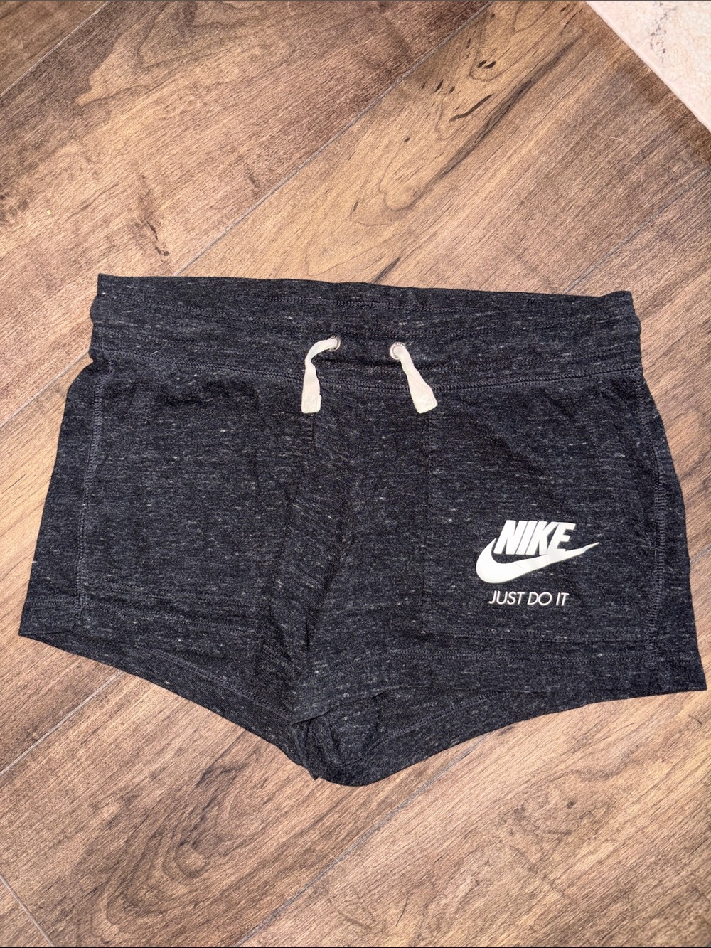 Nike Women’s Dark Heather Athletic Shorts with White Logo